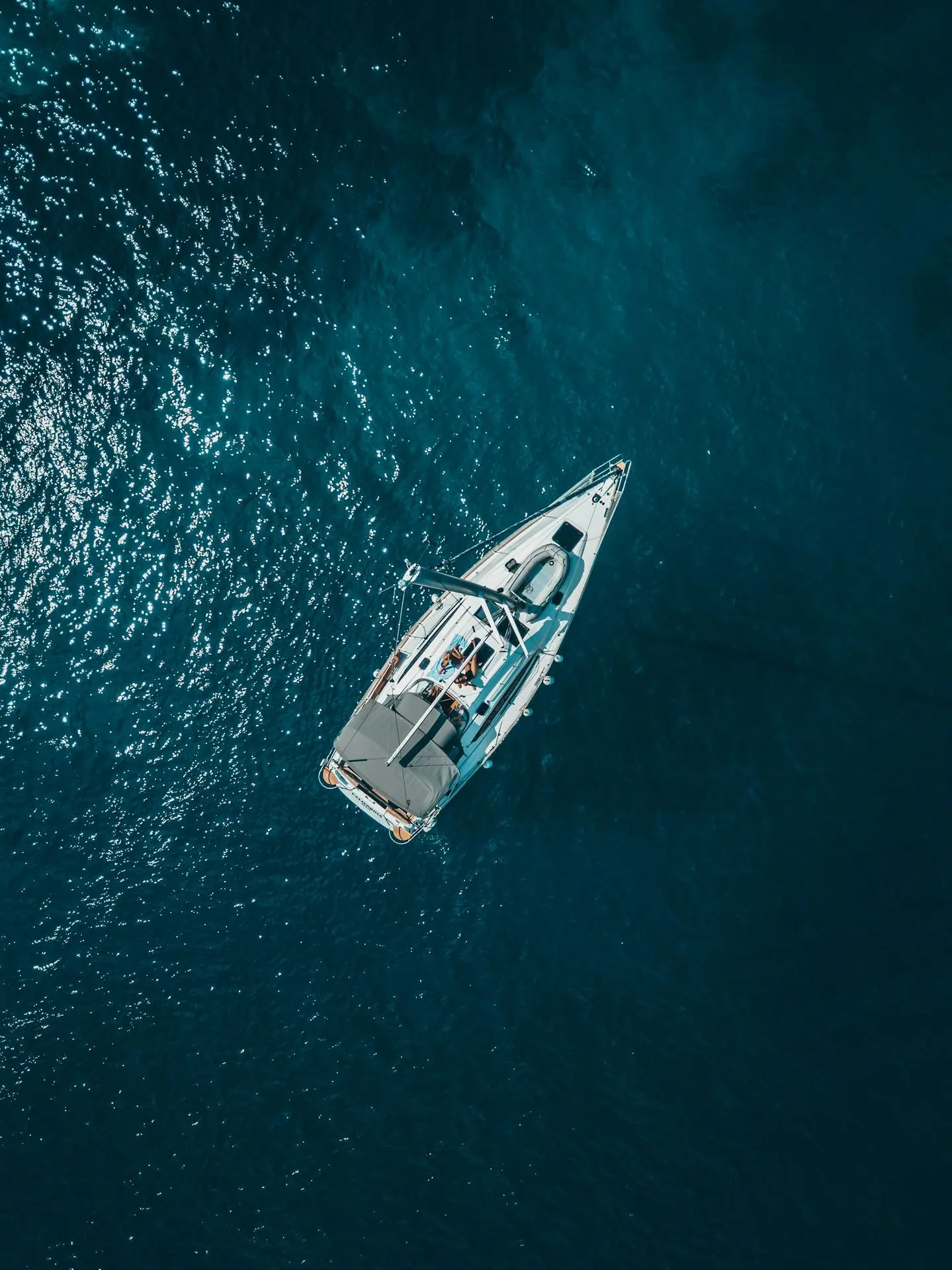 aerial view of white boat sailing